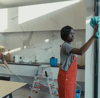 a woman cleaning a refrigerator door