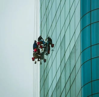 two workers cleaning a commercial building
