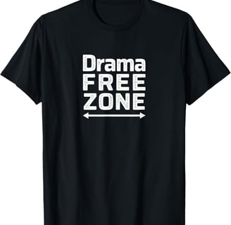 a black and white t - shirt with the words drama free zone