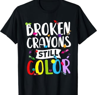 a black t - shirt with the words broken crayon's still color