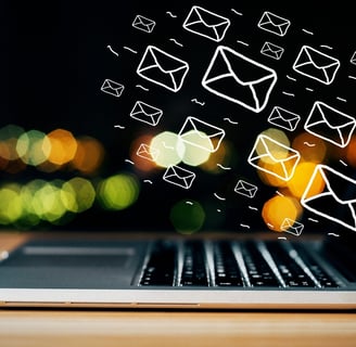 a laptop computer with a lot of mailboxes coming out of it-Digital marketing Course