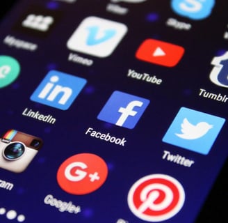 a cell phone with a bunch of social media icons