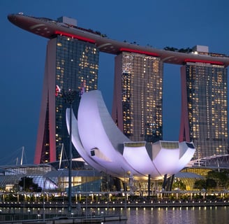 a large building with a large white lotus flower