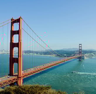 a bridge spanning the golden gate bridge over looking the water