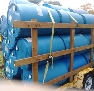 A trailer of upcycled plastic barrels