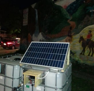 Solar powered IBC tote rainwater system in Boston MA