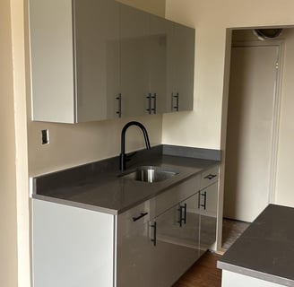 a kitchen with a sink and a sink