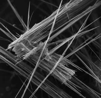 Close-up view of asbestos material being safely removed by licensed asbestos abatement professionals