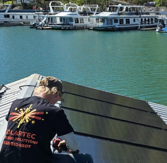 SolarTec installer setting panels at Norris lake