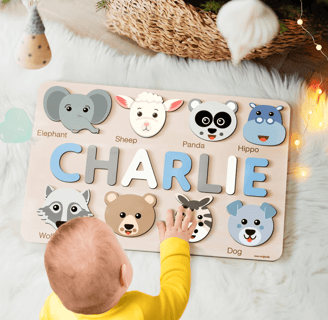 a baby's name on a wooden name board