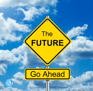your future is now! yield sign against a bright sunny sky filled with fluffy clouds