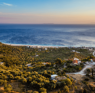 a view of a beach with a view of the ocean