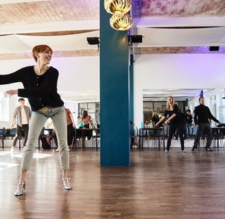 A female dance teacher teaching a class at Werk36.