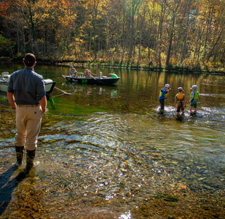 Kids love fly fishing the South Holston River.