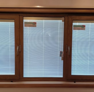 Integral blinds in uPVC window by Skill Construction