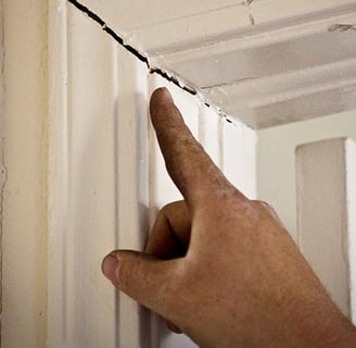 broken door frame as a sign of foundation issues