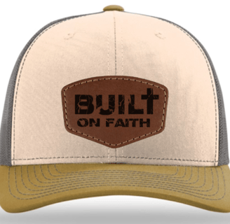 a brown and tan colored hat with a built on faith on it