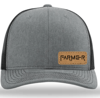 a gray and black hat with a leather patch on the front of a hat