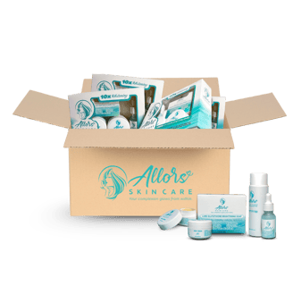 Cardboard box filled with Allors Skin Care products, including serums and creams, promoting glowing complexion.