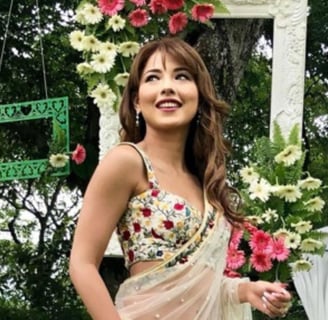 a model posing in front of our decoration