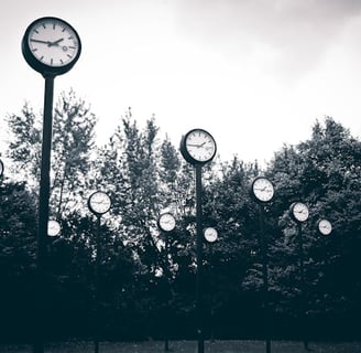 a clock tower with clocks on each of it