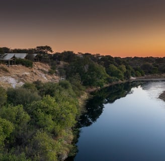 View over Meno-A-Kwena Tented Camp with the Boteti river Botswana