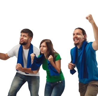 a group of people standing in front of a white background