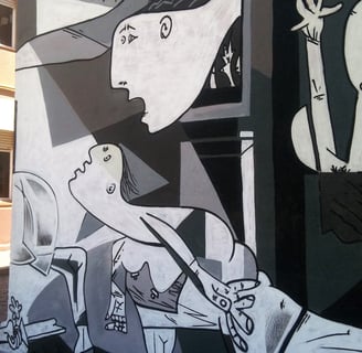 graffiti mural guernica fachada escuela