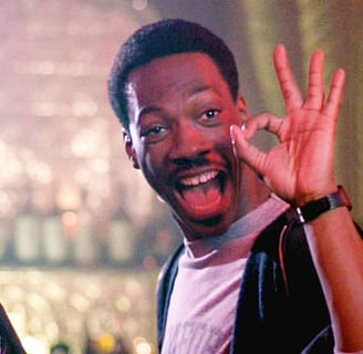 a man flashing the okay symbol