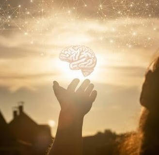 Hand holding an illuminate brain map showing the brain before meditation.