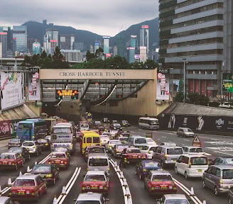 Traffic jam in a highway representing how the brain can be before meditation works the issue.