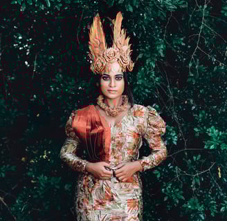 a woman in a dress and a hat with feathers on it