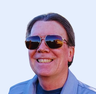 a man wearing sunglasses and sunglasses with a tie