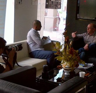 author rob hamilton getting photographed and interviewed