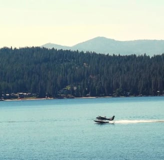 Coeur d'Alene, ID - A seaplane landing on Lake Coeur d'Alene after the aerial tour