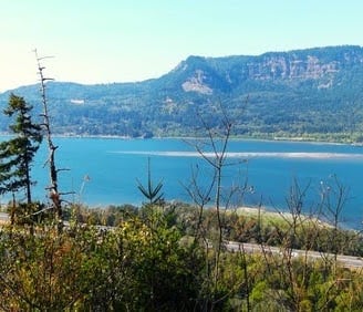 Columbia River Gorge, Oregon - the border between OR & WA, and the cliffs rise 4,000 ft.