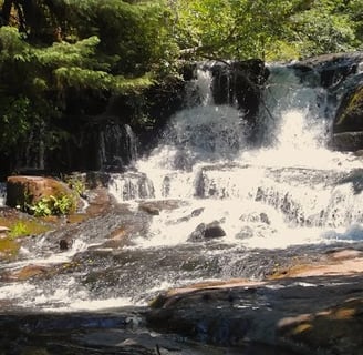 Eugene, OR - McDowell Falls cascades down the rock ledges