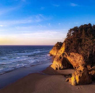 Oregon Coast - The beach, Hug Point State Rec Site with a warm glow before sunset