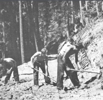 Snoqualmie, WA - The first dirt Wagon Road, black/white photo of construction workers 1867