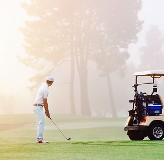 A man playing golf