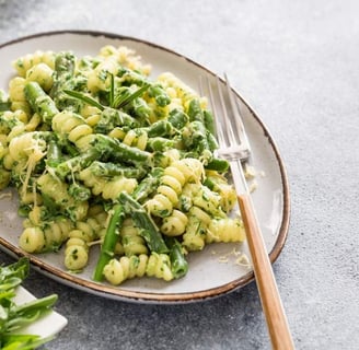 Creamy fusilli pasta dish with rich sauce, garnished for a delicious Italian meal