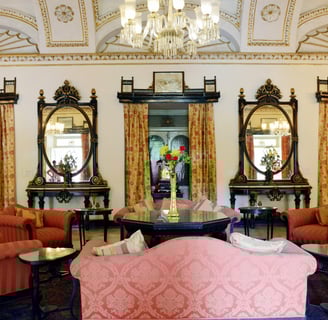 Photos of the hotel’s eco-friendly initiatives, such as green spaces, water conservation systems, or