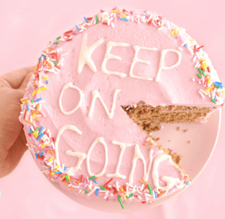 image of a cake that says KEEP ON GOING
