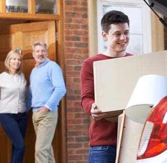a man and woman sending kid off to college