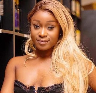 Efia Odo in a black dress.