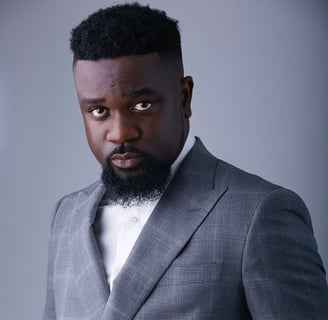 Sarkodie in a silky suit.