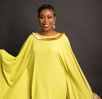 Queendalyn Yurglee in a gorgeous yellow dress.