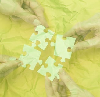 a group of people holding puzzle pieces of puzzle pieces - to show connection