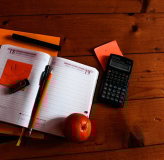 a notebook with a calculator and a calculator