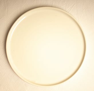 a white plate with a white plate with a white plate with a white plate with